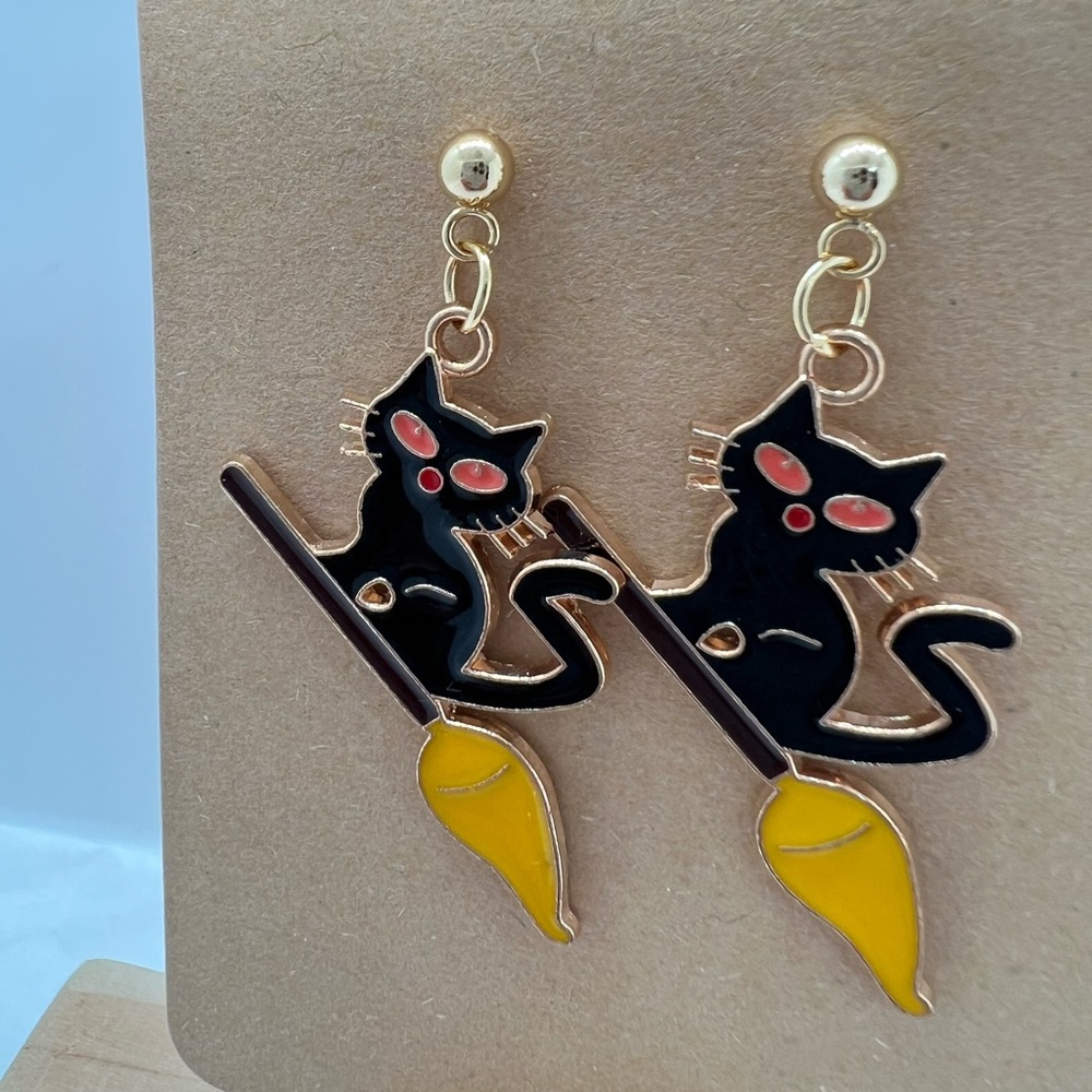 Halloween Cat flying on a broom earrings